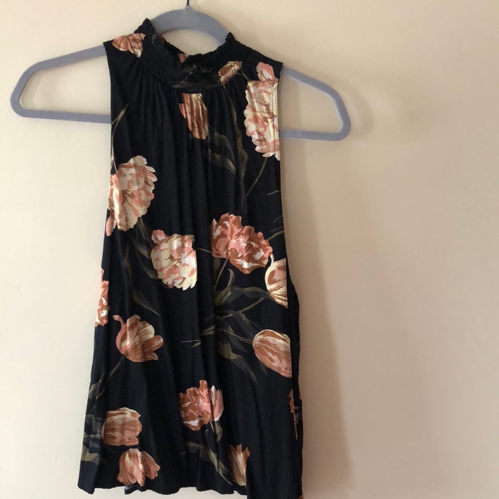 Black floral top. Halter cut.